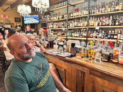 Home remodeler Bill Peterson, 61, sits at a bar in Bardstown