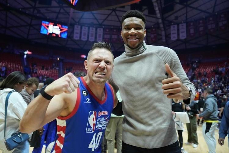 The Miz poses for a photo with then-Milwaukee Bucks superstar Giannis Antetokounmpo during the 2023 NBA All Star celebrity game in Salt Lake City.