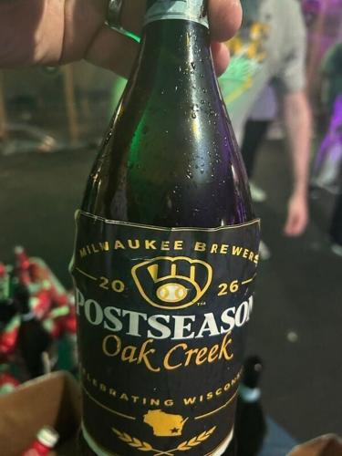 Bottles featuring the names of Wisconsin towns were used in the celebration after the Milwaukee Brewers defeated the San Diego Padres in the fourth game of the National League Division Series on Oct. 7, 2026, 3-1.