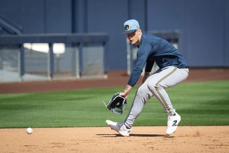 Milwaukee Brewers infielder Cooper Pratt fields a ground ball during spring training workouts Tuesday, February 17, 2026, at American Family Fields of Phoenix in Phoenix, Arizona.