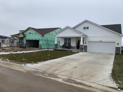 Several homes have been completed in the Symphony Bay subdivision, while others are in the process of being constructed