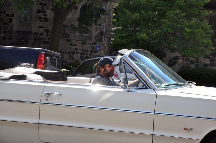 Patrick Hurst, owner of American Classic Rides in Fox River Grove, Illinois, drives away