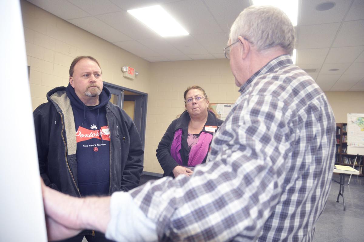 William and Judith Wieczorek of town of Bloomfield at merger meeting