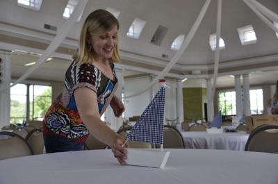 Kelly Jenk setting up for wedding inside Riviera