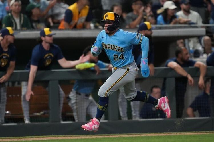 Milwaukee Brewers catcher William Contreras scores during the ninth inning against the Athletics.