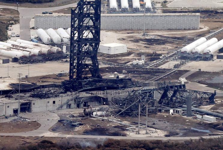 Damage at the site of a launchpad after an uncrewed Blue Origin New Glenn rocket exploded during a test at the Cape Canaveral Space Force Station