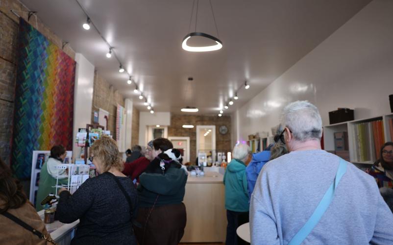 Patrons shop at Stitched for the first time