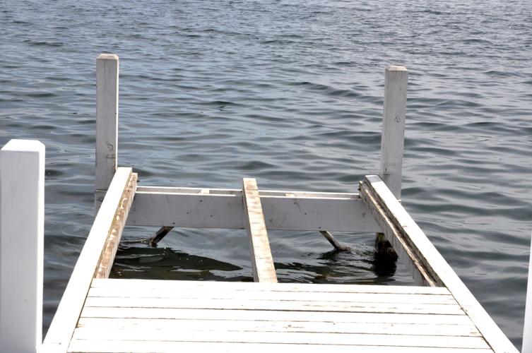 Damaged boards on Lake Geneva's piers are in the process of being replaced and repaired