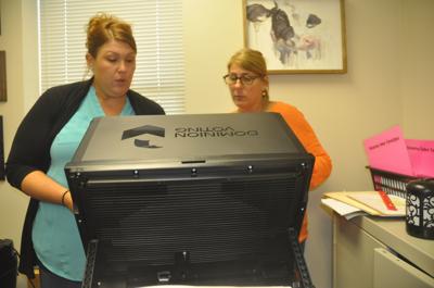 Lana Kropf and Nan Elder city clerks with new voting machine