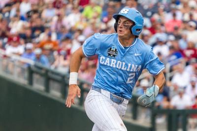 Jun 20, 2026; Omaha, NE, USA; North Carolina Tar Heels shortstop Jake Schaffner (2) runs to third after a double against the Oklahoma Sooners by a teammate during the first inning at Charles Schwab Field. Mandatory Credit: Dylan Widger-Imagn Images