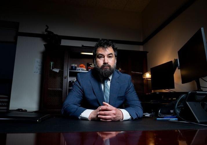 Kenosha County District Attorney Xavier Solis sits in his office in the Molinaro Building on Tuesday, Dec. 23, 2025 in Kenosha, Wisconsin.