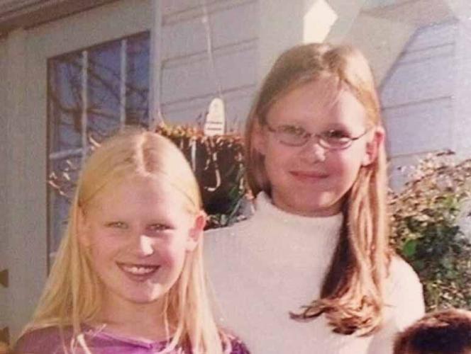 Elena Nicholson shown as a child with her sister after being adopted