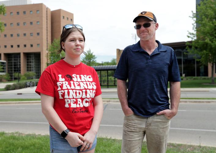Kaylee and Terry with building