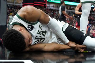 Giannis Antetokounmpo wrist injury, AP photo