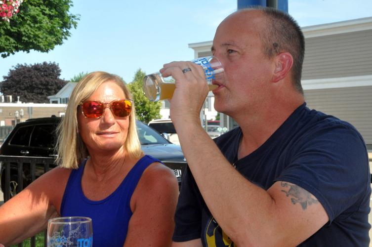 Jill Rasmussen and Dave Rasmussen sample some craft beers at the Topsy Turvy Brewery, 727 Geneva St. in downtown Lake Geneva
