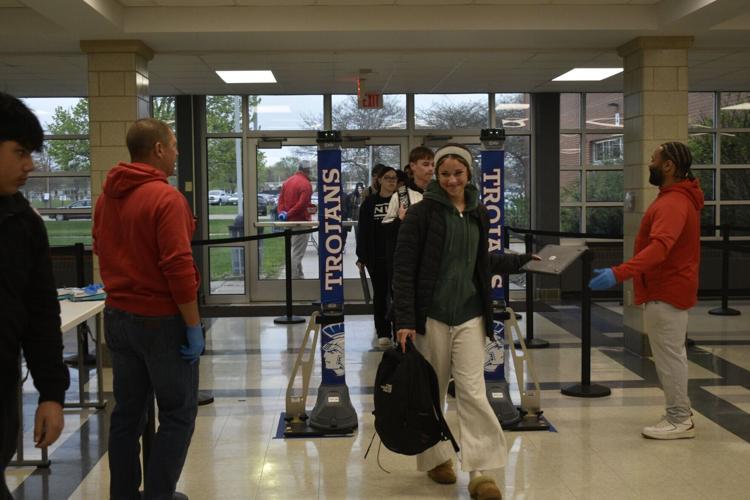 Tremper students walk through metal detectors
