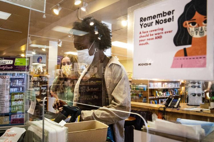 FOR SOME, MASKS REMAIN