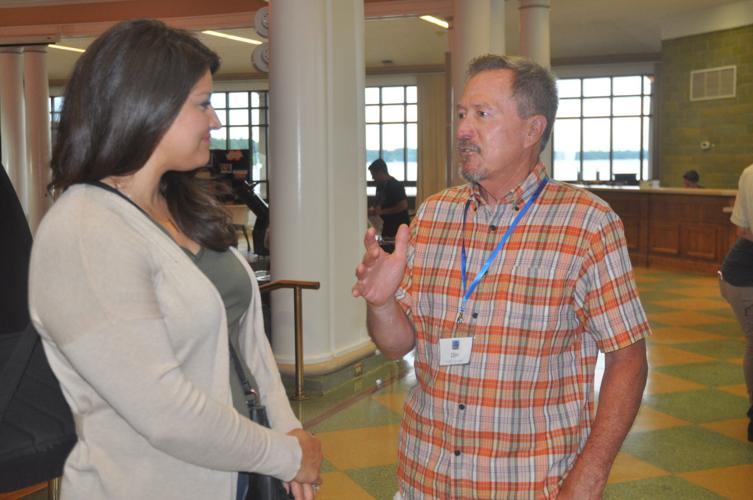 Don Skalla, member of the Geneva Dark Sky  Initiative, talks to Maira Ochoa of Lake Villa, Illinois