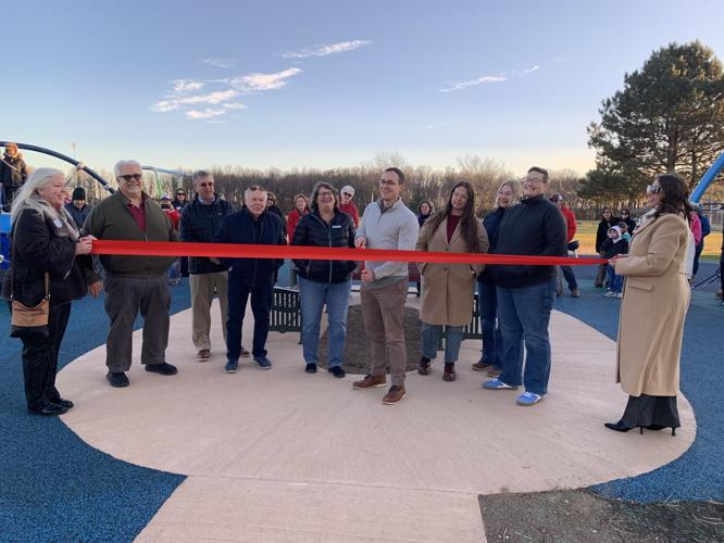 A ribbon-cutting ceremony was held Nov. 12 to celebrate the opening of a new playground in Veterans Park