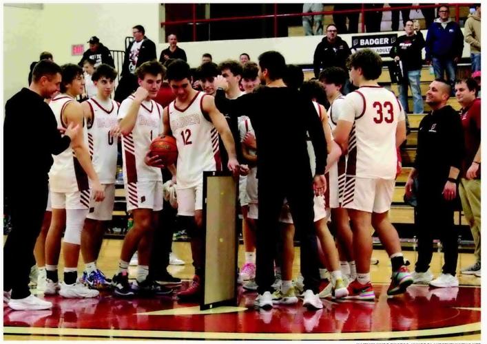 Badger double header ends in 2 wins and Walser's 1000th career point