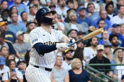 Brewers center fielder Garrett Mitchell watches his two-run home run in the first inning of a game Sept. 12 against the Reds at American Family Field.