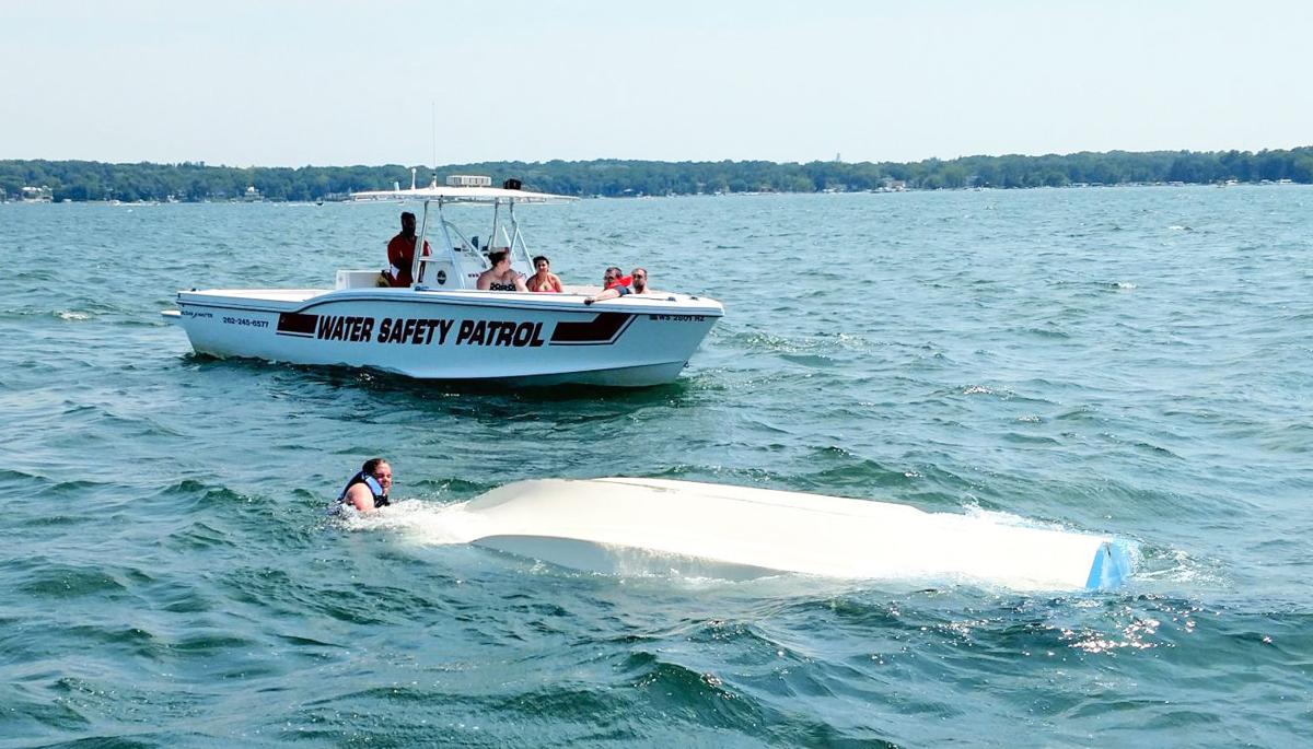 Four rescued after boat capsizes on Geneva Lake
