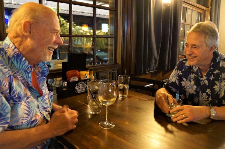 The Aloha Boys socialize during a visit to Tuscan Tavern & Grill, Lake Geneva