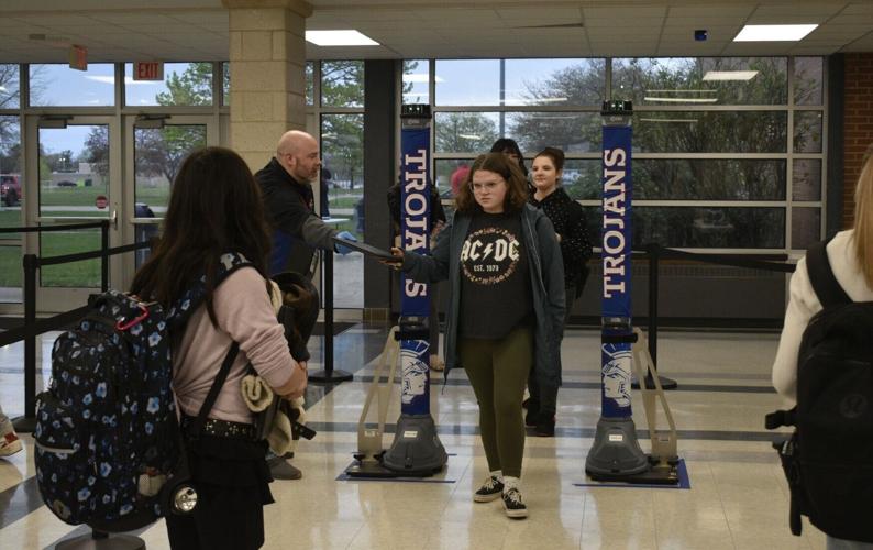 Tremper students walk through metal detectors