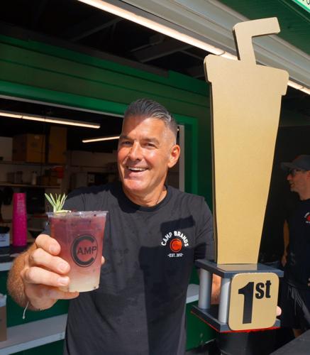 Bartender Brad Yates serves up a first-place Drinkies winner Ferris Mule at the Wisconsin State Fair