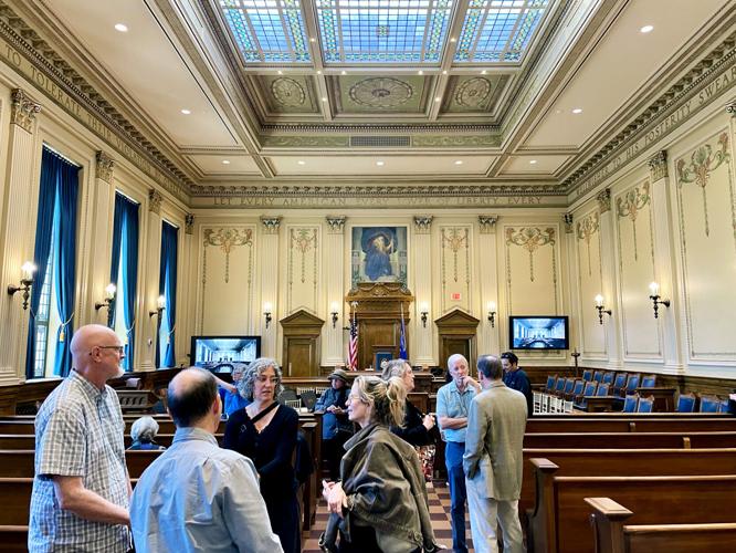 Visitors inside ceremonial courtroom