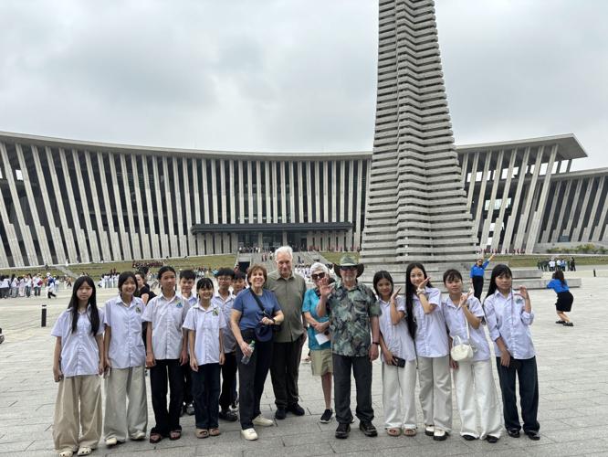 Schoolchildren in Hanoi greet our group at the War Museum.