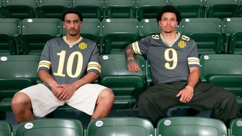 Packers QB Jordan Love (10) and WR Christian Watson show off Green Bay's new "Rivalries" uniforms.
