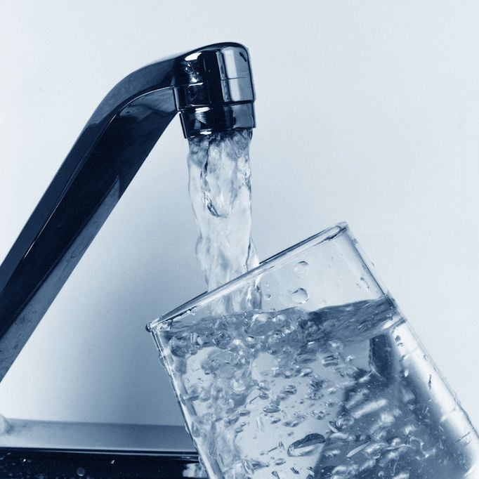 Water with faucet and glass generic free image