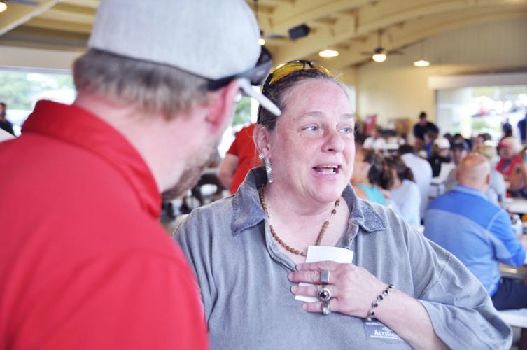 Jeanne Cizon food pantry with Nate Love of Jaycees