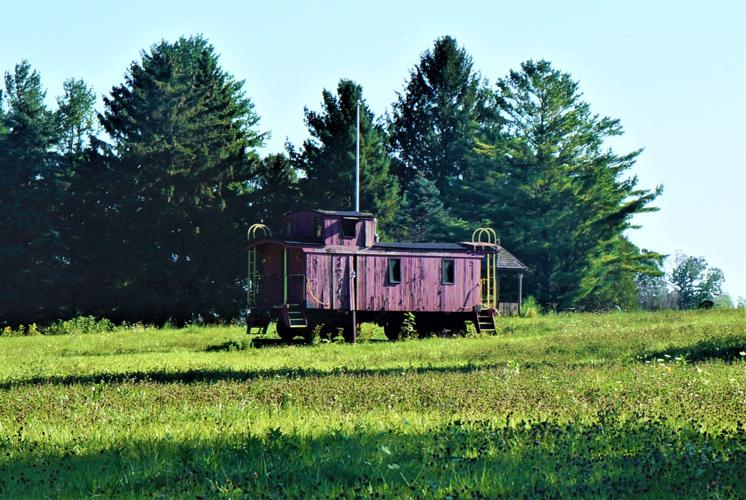Old railroad caboose along Rustic Road 120 in the Town of Lafayette