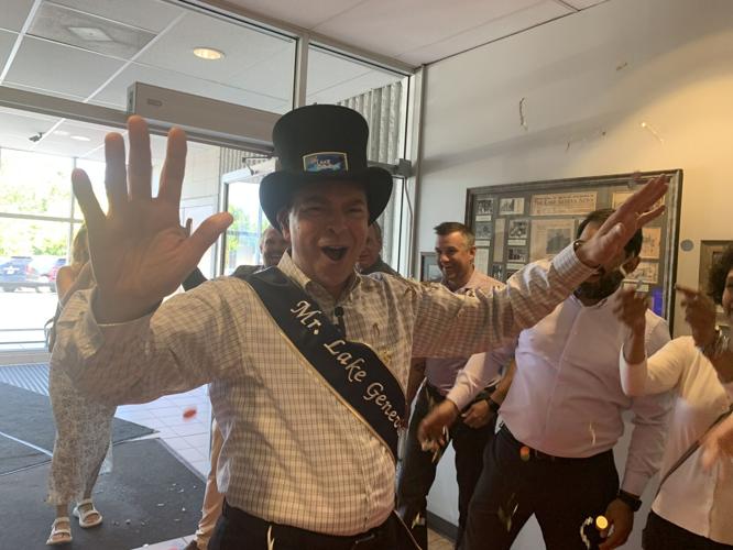 Mr. Lake Geneva Skip Harless enters the Geneva Lakes Family YMCA in grand fashion