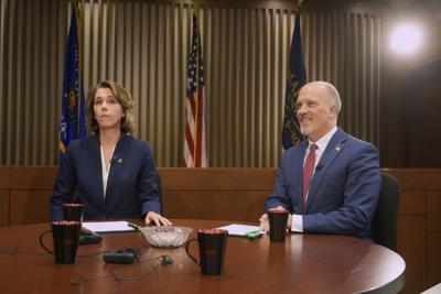 Brad Schimel, Susan Crawford at debate, AP photo
