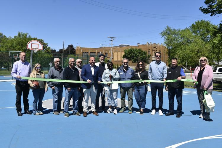 Ribbon cutting at Lincoln Park basketball courts