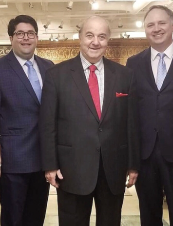 Noureddin "Noure" Nateghi-Asli, centered, is pictured with his son Dariush Nateghi-Asli, right, and friend Clint Bargmann, left