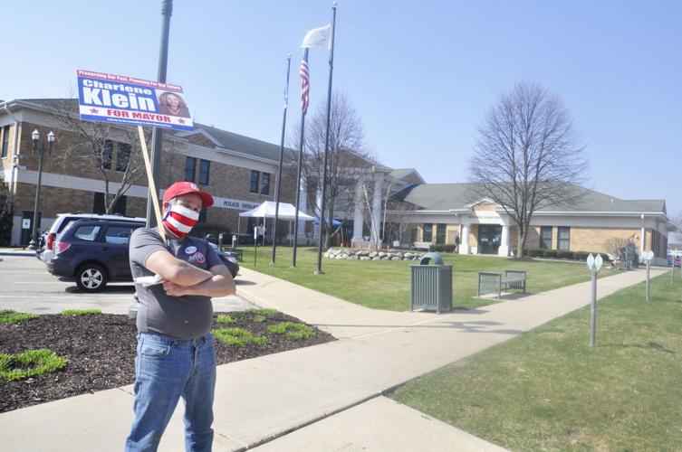 Charlene Klein backer campaigns outside City Hall