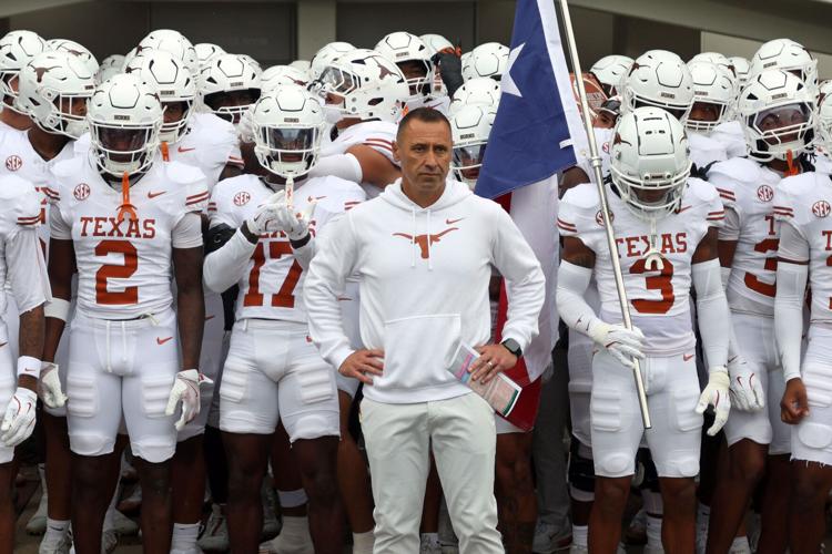 Texas Longhorns coach Steve Sarkisian waits to lead his team onto the field prior to the game against the Mississippi State Bulldogs at Davis Wade Stadium at Scott Field.