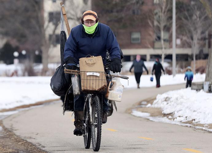 Can Collector biking through Brittingham