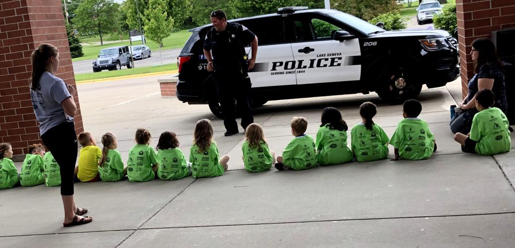 School resource office Theon Ward of the Lake Geneva Police Department talks to children about safety