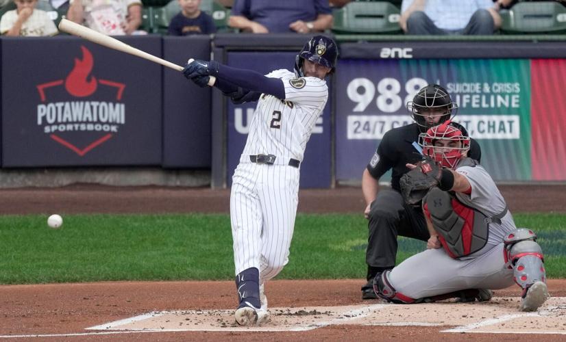 Brewers second baseman Brice Turang drives in a run with a single during the first inning for his 100th RBI of the season