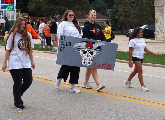 Williams Bay High School Spanish Club marches in the 2023 homecoming parade