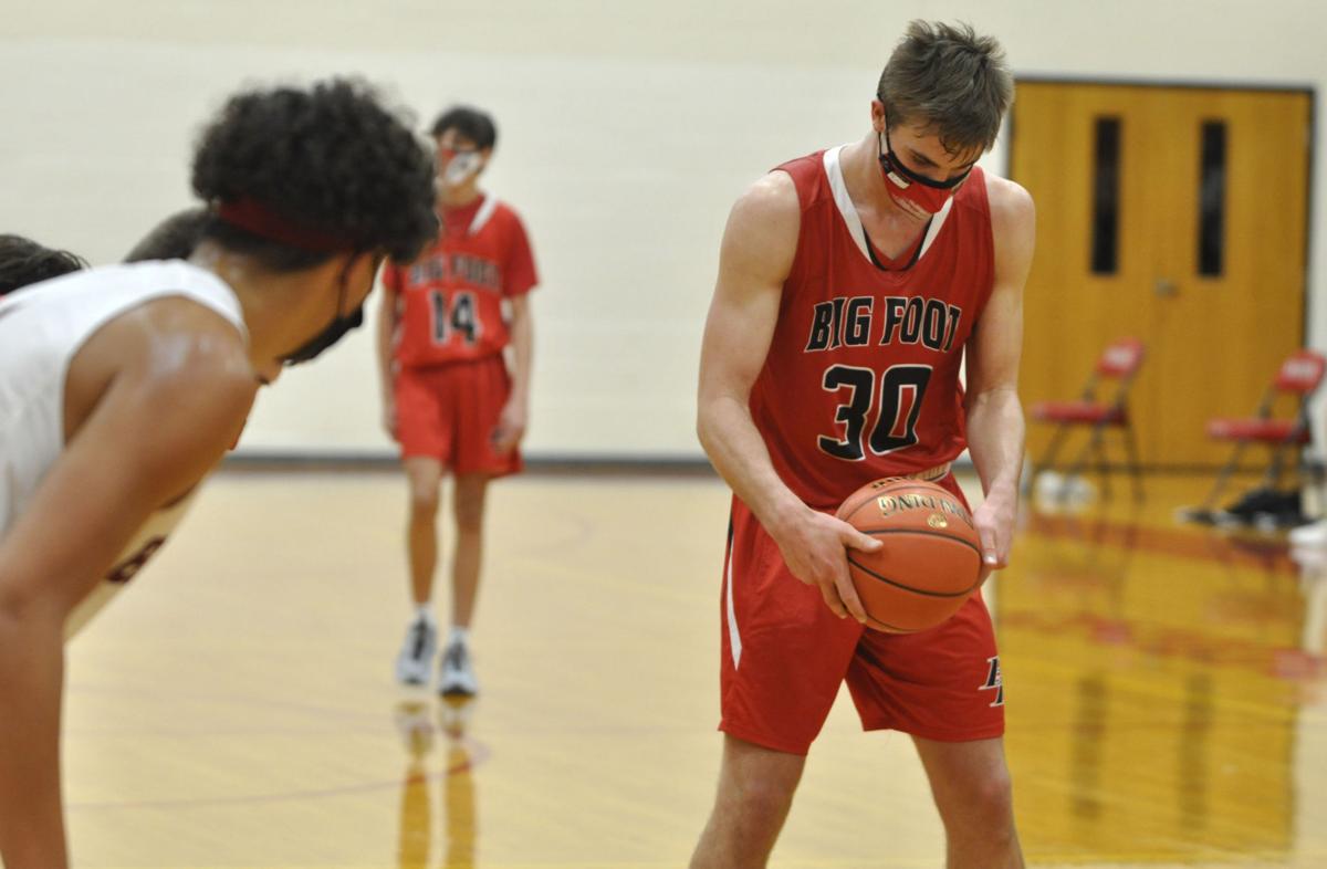 Big Foot High School's Gus Foster looks at the ball as he prepares to shoot a free throw