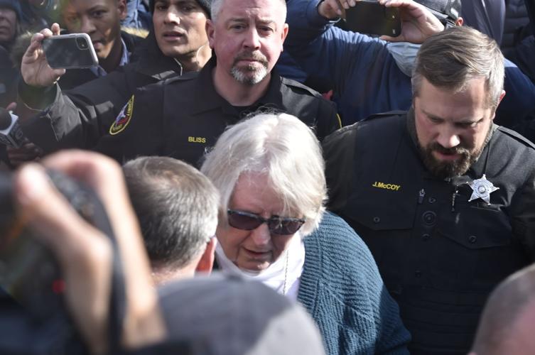 Susan Hughes escorted from Kenosha County Courthouse Friday