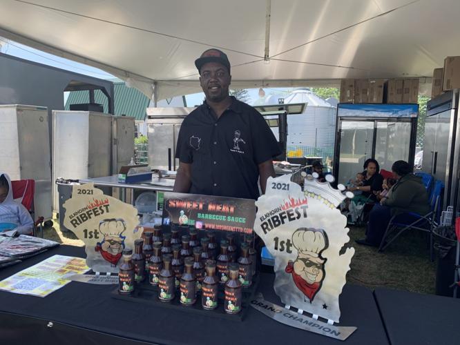 Thomas Green Jr displays barbecue sauces