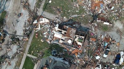Damage is seen to homes and businesses in Menasha, Wisconsin on July 28, 2026 after an estimated EF-3 tornado tore through the area on July 27.