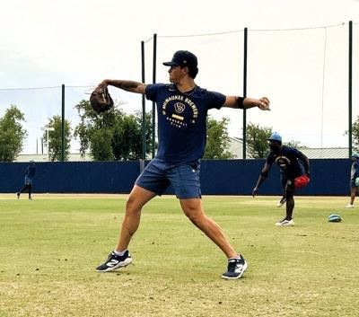 Milwaukee Brewers pitcher Frank Cairone warms up on a back field at American Family Fields of Phoenix on July 4, 2026.